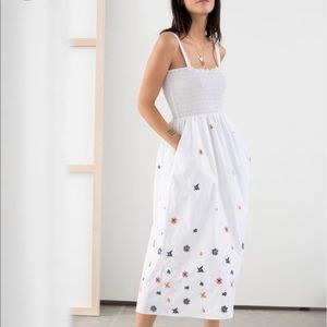 Embroidered smocked white midi dress